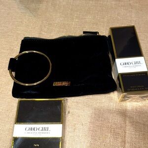 New Carolina Herrera bag, key chain and body lotion